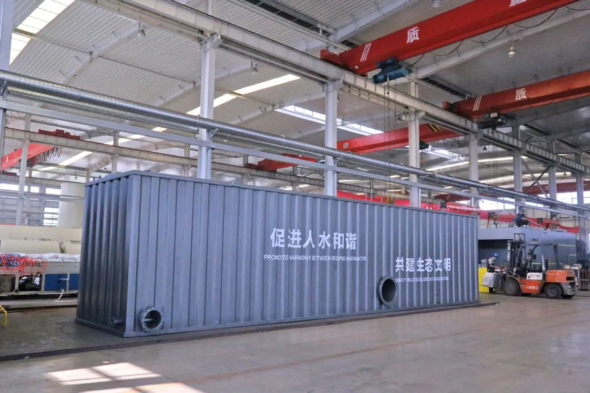 Containerized wastewater treatment plant equipment in workshop